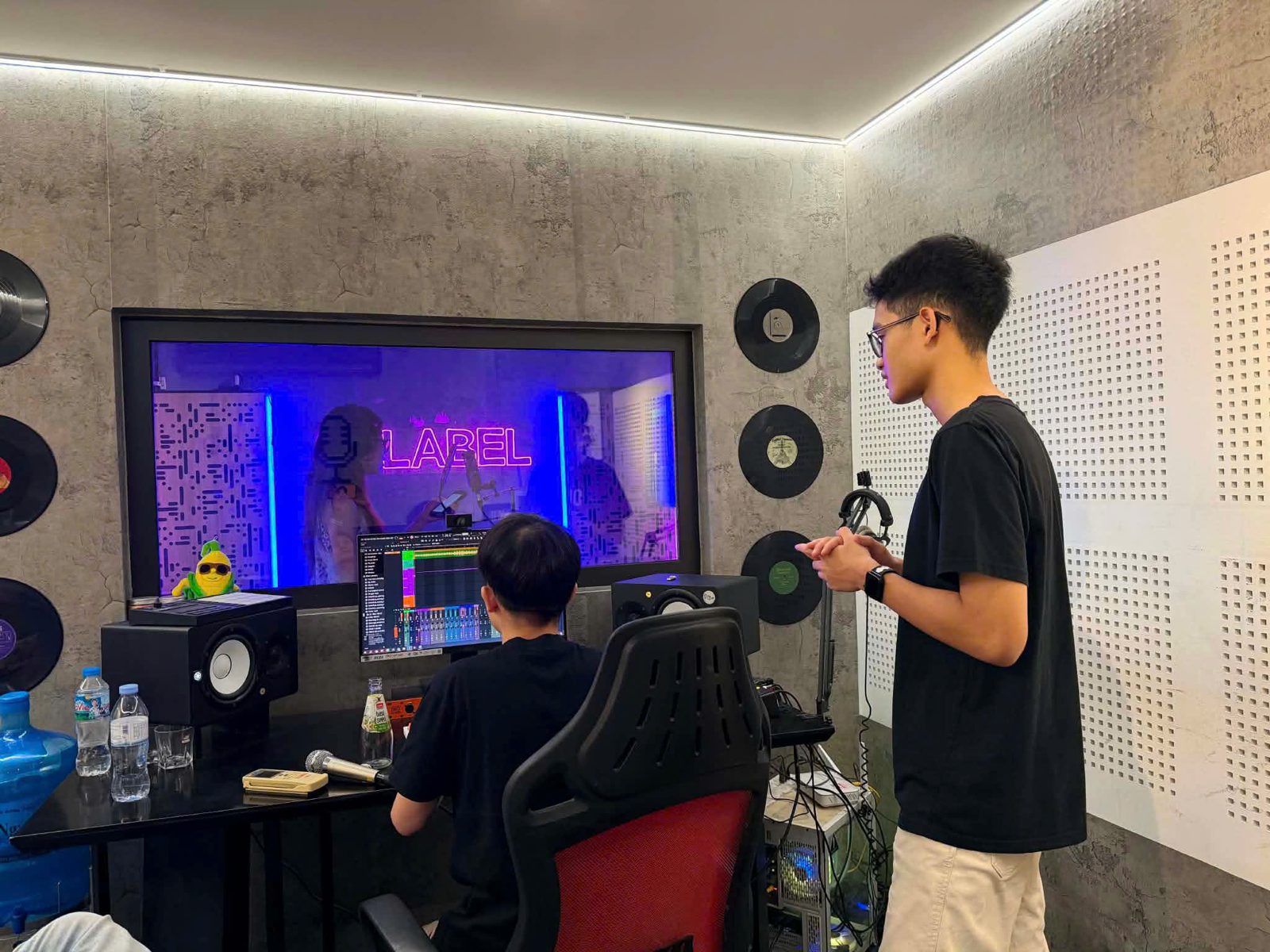 July 15: Hien Anh Tran records the final vocals while I listen from the control room.