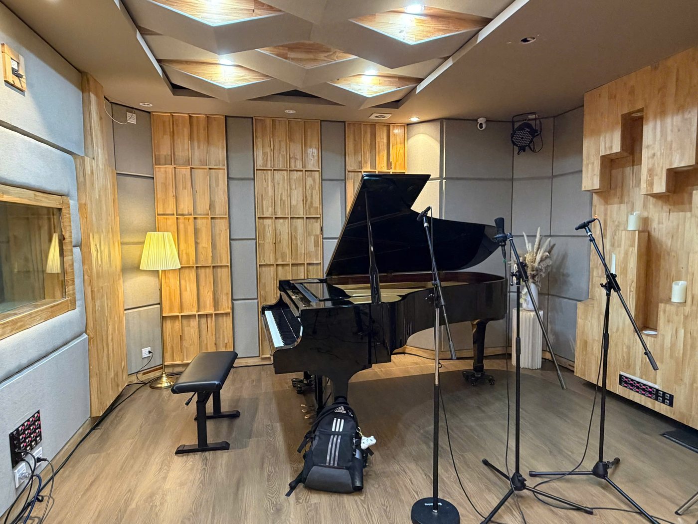 The grand piano and microphones, ready for the session.